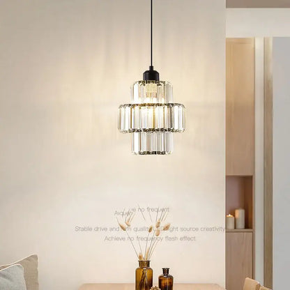 A decorbites crystal chandelier with clear faceted glass rods and black metal fixture for elegant modern lighting