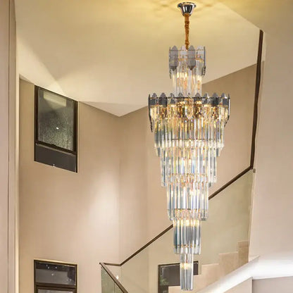 Decorbites crystal chandelier with cascading clear and frosted glass rods and brass finish for luxury interiors