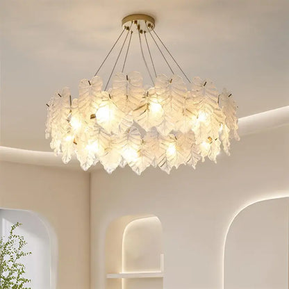 Elegant white glass leaf crystal chandelier with gold-toned ceiling mount by DecorBites for living and dining rooms