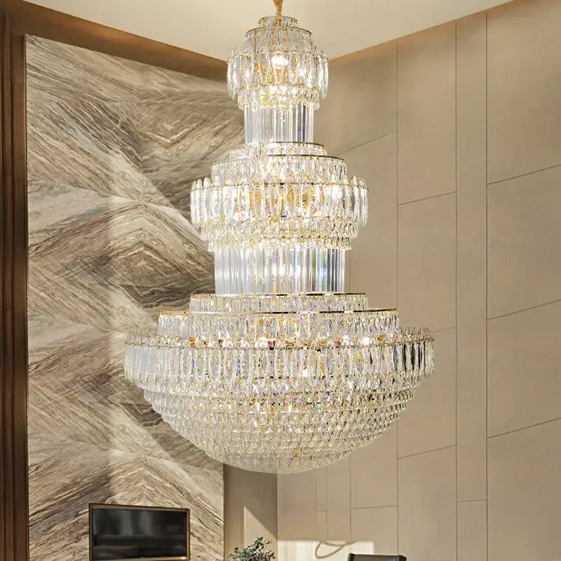 DecorBites crystal chandelier with multi-tiered clear glass prisms and gold-toned accents for elegant home lighting