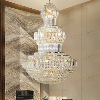 DecorBites crystal chandelier with multi-tiered clear glass prisms and gold-toned accents for elegant home lighting