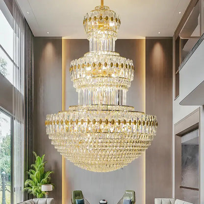 Decorbites crystal chandelier with gold accents and cascading clear crystals for elegant home and hotel lighting