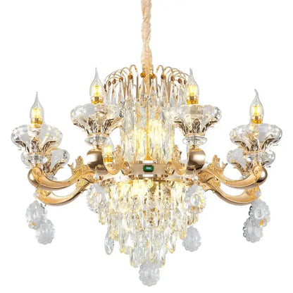 Gold-toned decorbites crystal chandelier with intricate crystal droplets and green gemstone for elegant living spaces