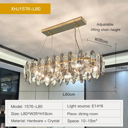 A modern decorbites crystal chandelier with clear crystal droplets and gold hardware perfect for living or dining rooms