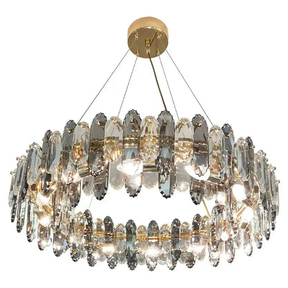 Two-tiered gold-toned decorbites crystal chandelier with faceted clear crystals for living dining and bedroom lighting
