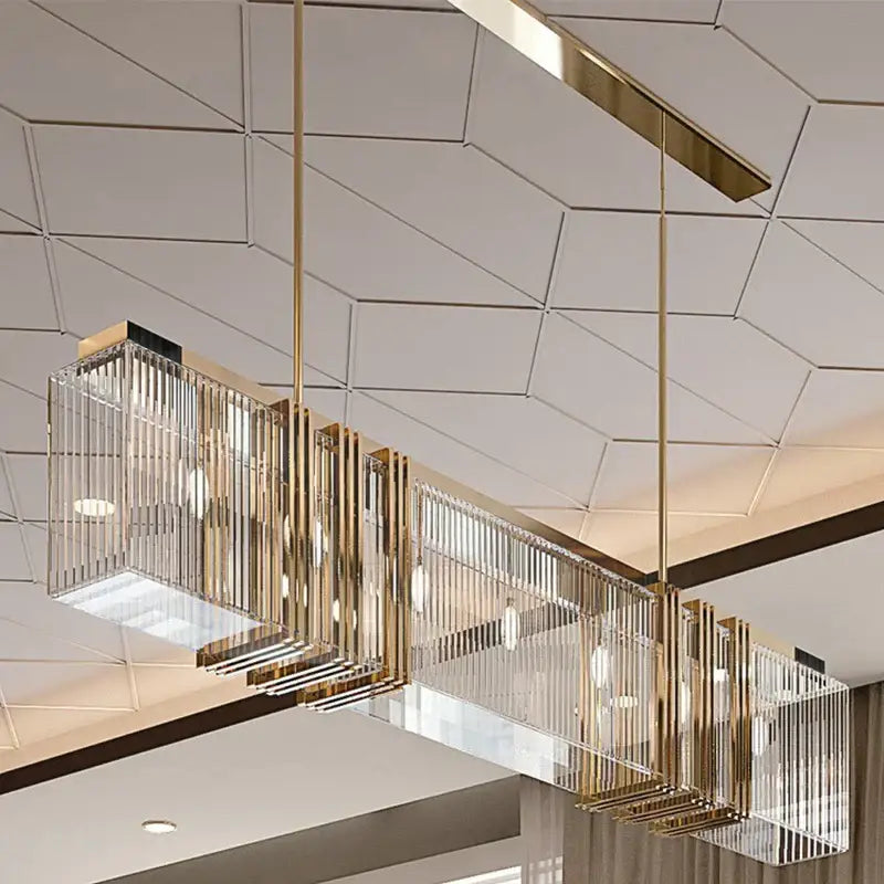 Modern rectangular decorbites crystal chandelier with gold-toned metal frame and vertical crystal rods for interior decoration