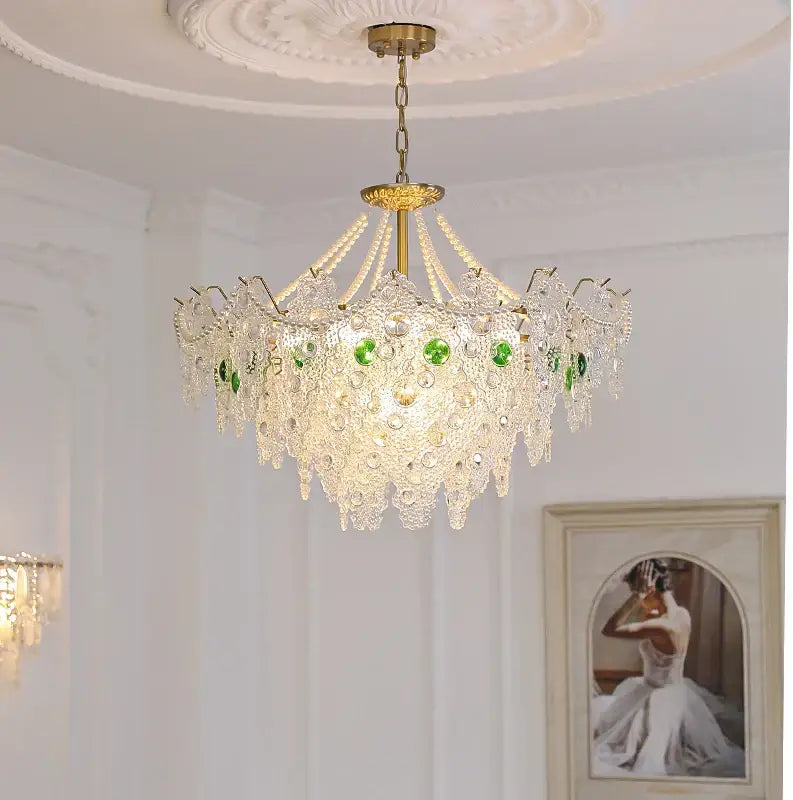 DecorBites crystal chandelier with gold-toned frame and cascading clear and green crystals for elegant lighting