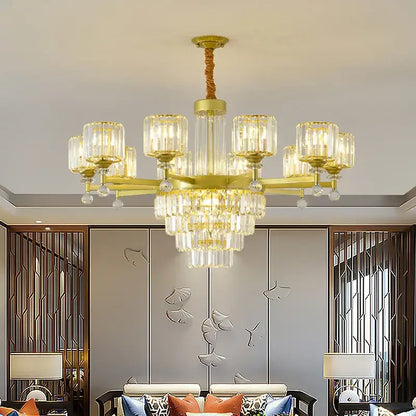 Gold-toned decorbites crystal chandelier with clear glass shades and dangling crystals for elegant retro lighting