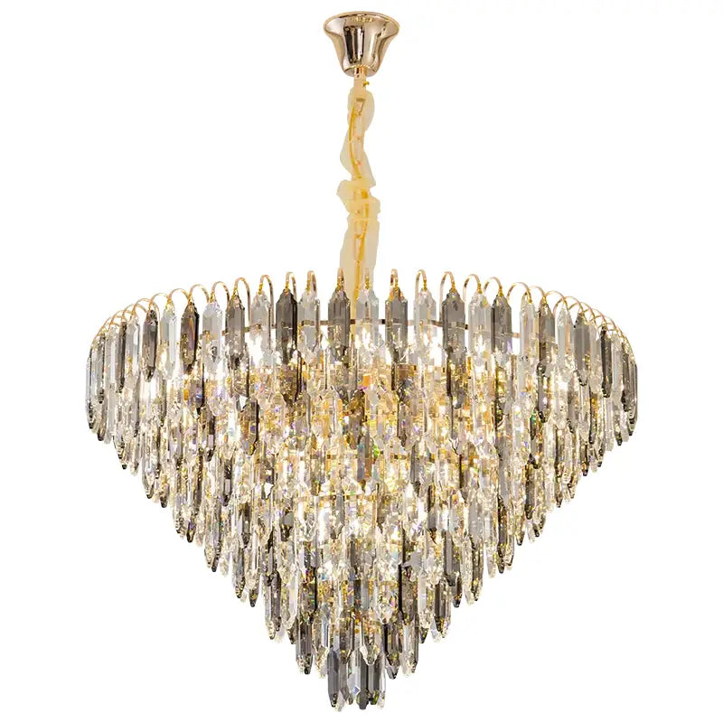 A decorbites crystal chandelier with heart-shaped clear and gold glass prisms hanging from polished brass mount
