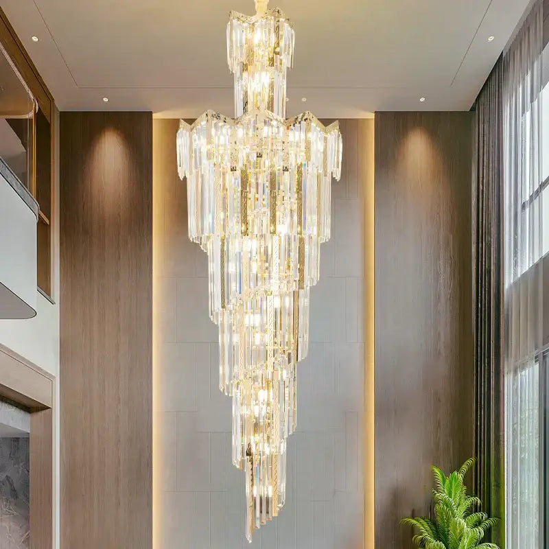 DecorBites crystal chandelier with multi-tiered clear prisms and warm golden lighting for luxury middle floor decor