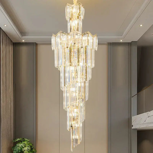 DecorBites crystal chandelier with multi-tiered clear glass prisms and gold accents for elegant villa hotel lighting