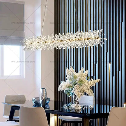 Decorbites crystal chandelier with clear faceted crystals and gold-toned frame for elegant living and dining room lighting