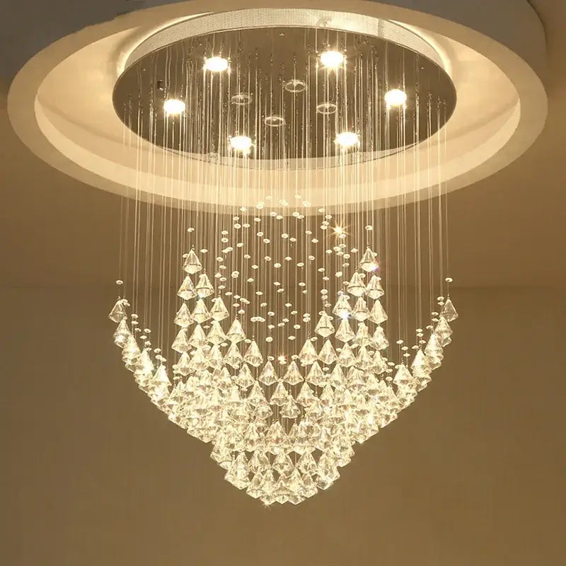 A modern circular decorbites crystal chandelier with cascading prisms and led lights for living room and bedroom
