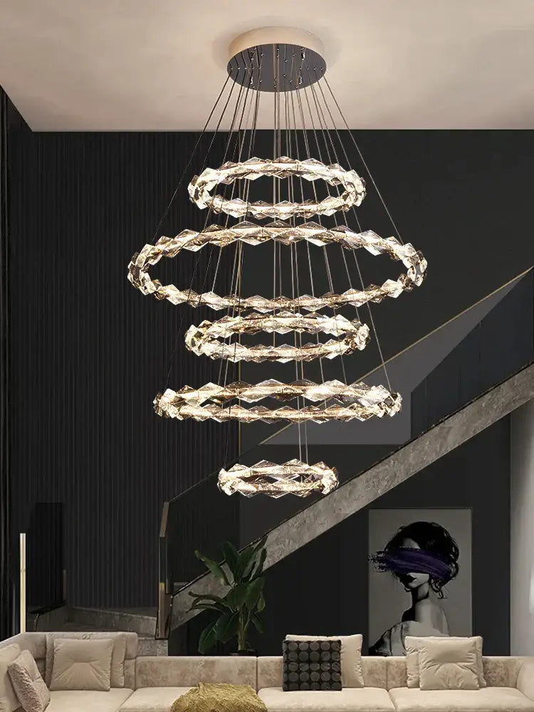 DecorBites crystal chandelier with cascading crystal rings and metallic mount for modern luxury living spaces
