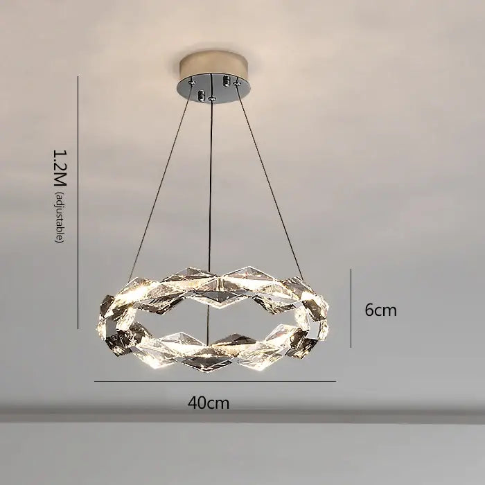 Modern decorbites crystal chandelier with faceted clear glass rings and chrome mount for luxury living spaces lighting