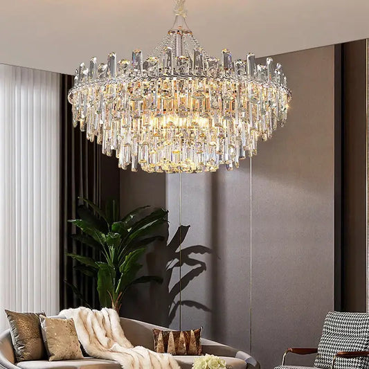 Decorbites crystal chandelier multi-tiered with clear and gold prisms on polished metal for modern luxe interiors
