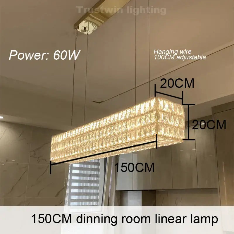 A 150cm DecorBites crystal chandelier with a rectangular crystal design and warm golden light for dining rooms