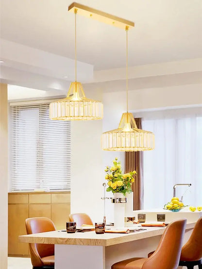 Gold-toned rectangular pendant light with woven translucent glass shades from DecorBites crystal chandelier for elegant decor