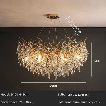 Gold-toned decorbites crystal chandelier featuring intricate aluminum and crystal leaf branch design for dining room