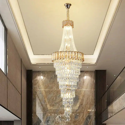 Decorbites crystal chandelier multi-tiered with gold-toned accents and polished chrome fixture for luxury duplex lighting