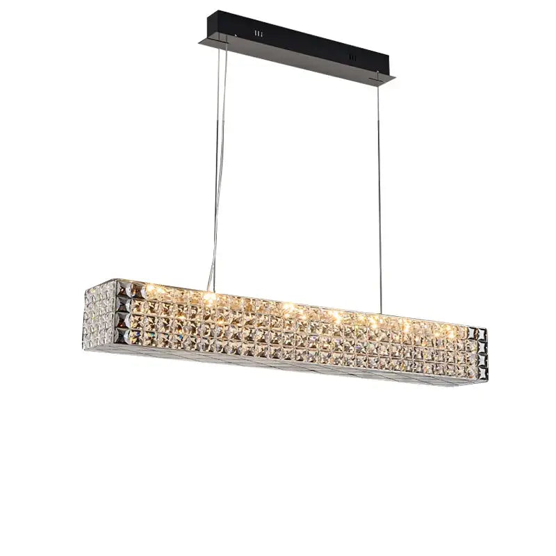 A modern decorbites crystal chandelier with clear crystal facets and chrome cords for ceiling dining room lighting
