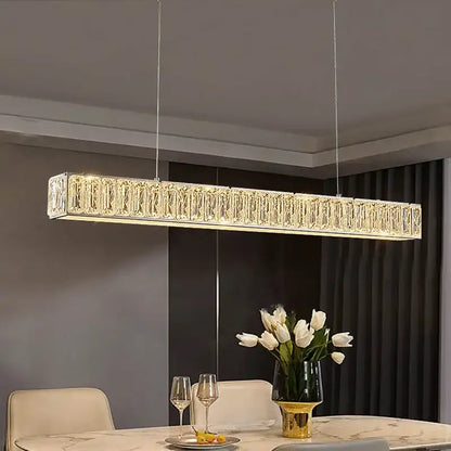 A modern luxury decorbites crystal chandelier led with elongated golden design and crystal elements for warm home lighting