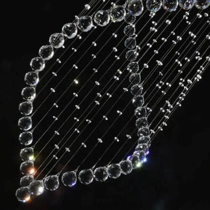 A decorbites crystal chandelier featuring clear faceted beads strung on thin wires for villa hall stairs lighting