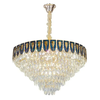 A decorbites crystal chandelier featuring multi-tiered clear crystal droplets and blue gold decorative panels for luxury spaces
