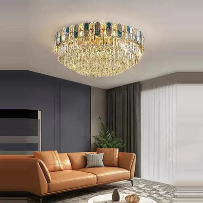 DecorBites crystal chandelier LED lighting with a circular tiered design featuring golden and teal accents for living room