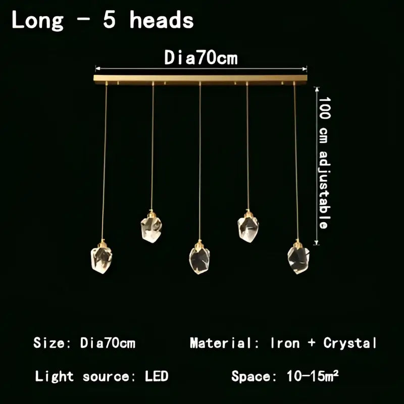 A decorbites crystal chandelier led pendant light with five faceted crystal pendants on a sleek brass iron bar