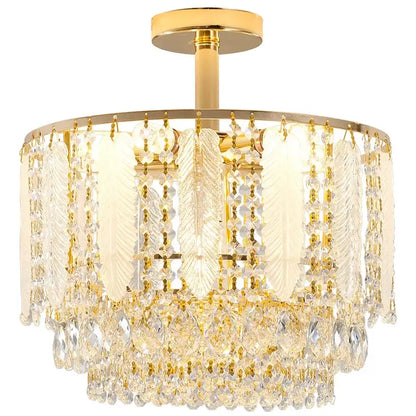 Gold-finished DecorBites crystal chandelier light with clear feather-shaped and cascading teardrop crystals for elegant decor