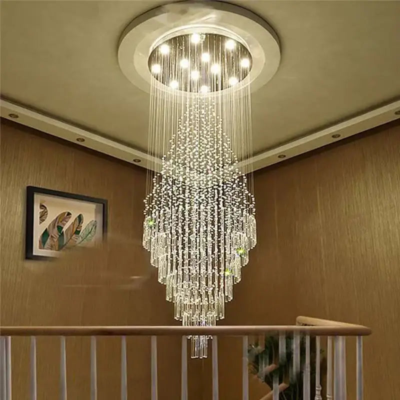 A modern multi-tiered decorbites crystal chandelier lighting with clear glass beads and embedded lights for luxury home decor