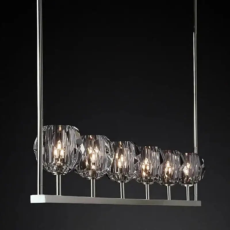 Modern crystal chandelier lights with five faceted glass shades and polished chrome rods for kitchen island decor
