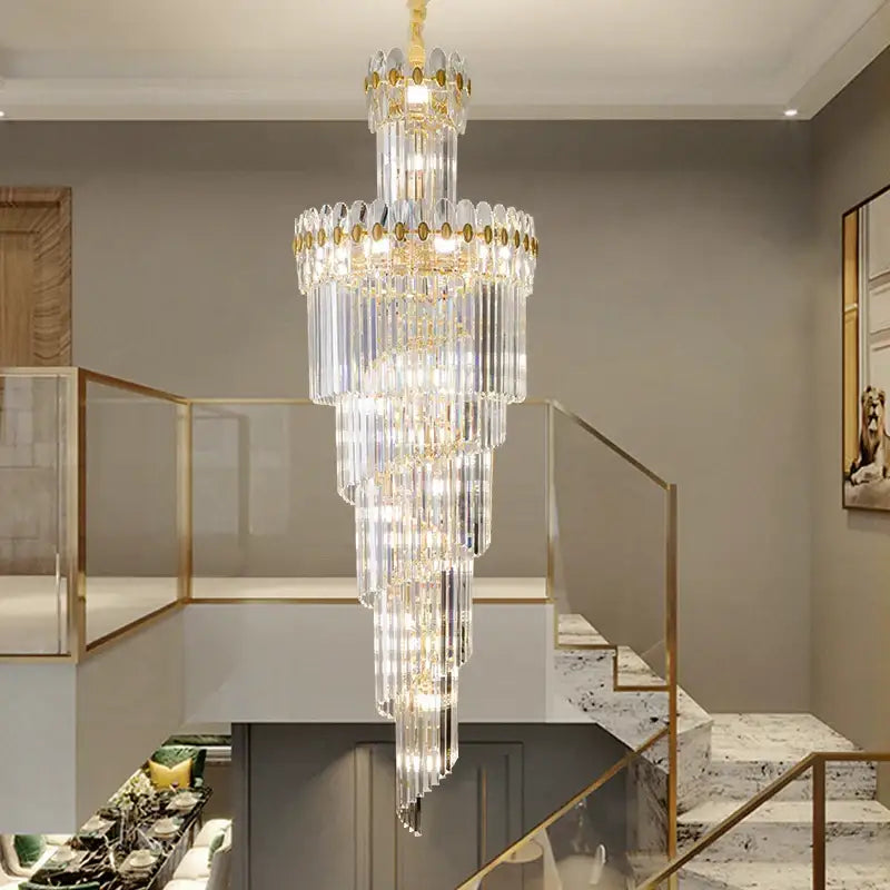 DecorBites crystal chandelier multi-tiered lighting fixture with gold accents and clear glass rods for luxe stairwell lighting