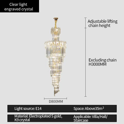 A tiered decorbites crystal chandelier with clear engraved crystal and electroplated gold accents for luxe stairwells