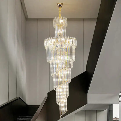 DecorBites crystal chandelier with gold ceiling mount and cascading glass rods for luxe stairwell lighting fixture