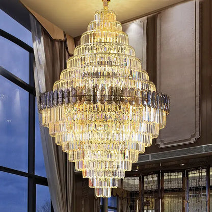 DecorBites crystal chandelier with cascading golden and clear glass prisms for penthouse villa stairwell lighting