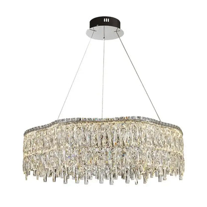 A modern decorbites crystal chandelier with black mount chrome chains and tiered clear crystal prisms for luxury lighting