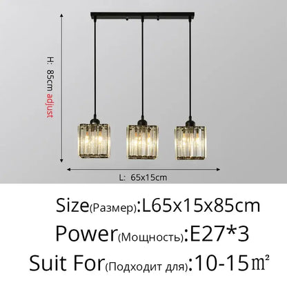 Black metal bar pendant light with three hanging glass prisms and warm bulbs in decorbites crystal chandelier design