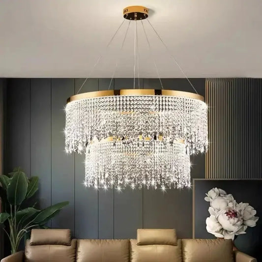 Luxurious decorbites crystal chandelier with tiered gold-toned accents and cascading clear crystals for ceiling lighting