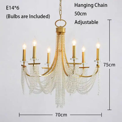 Gold-finished decorbites crystal chandelier with six candle-style bulbs and cascading clear crystal beads for indoor decor