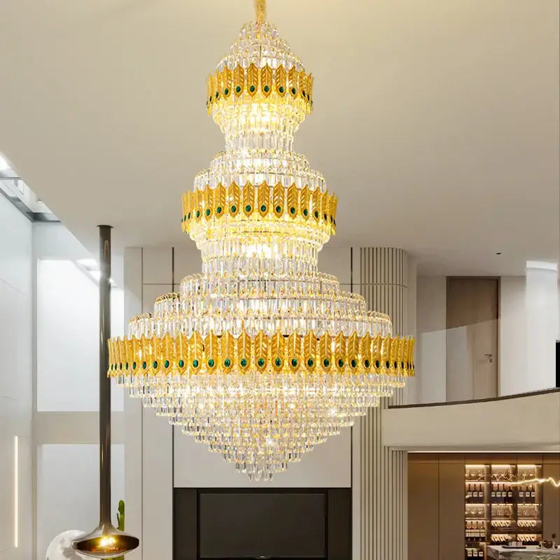 Decorbites crystal chandelier features gold leaf accents and emerald stones in a luxury high-end living room light fixture