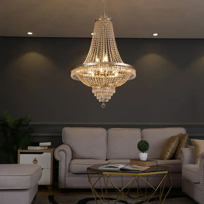 A luxurious DecorBites crystal chandelier with gold-toned frame and clear faceted crystals for elegant interiors