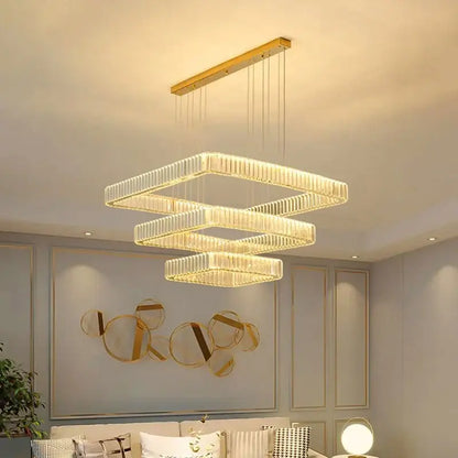 Modern gold-toned decorbites crystal chandelier with three stacked rectangular tiers for luxury living room and bedroom lighting