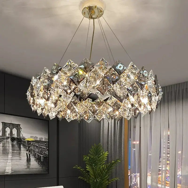 A modern circular decorbites crystal chandelier with faceted crystal layers for luxury living room and dining light