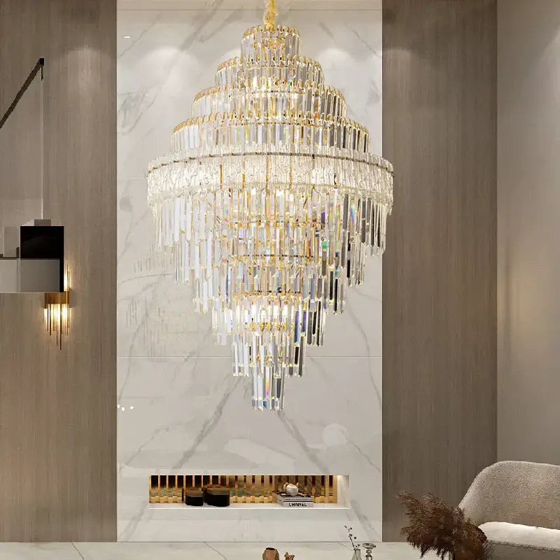Decorbites crystal chandelier with gold-toned metal and clear prisms for luxury living room elegant lighting option