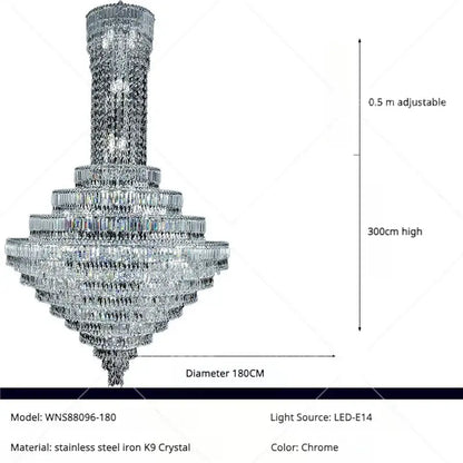 A tall multi-tiered chrome decorbites crystal chandelier with cascading crystals for luxury staircases and living rooms