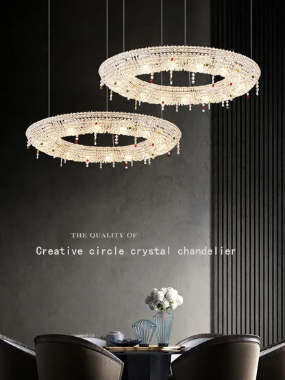 Two elegant decorbites crystal chandeliers with clear and red crystal droplets for living and dining rooms
