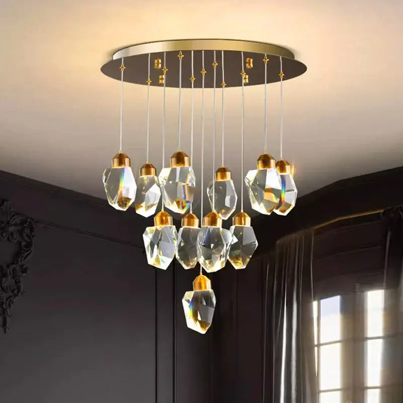 Modern decorbites crystal chandelier with gold ceiling mount and clear glass pendant lights for living and dining room