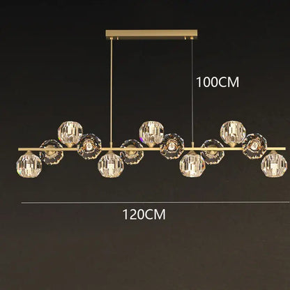 Gold-toned modern decorbites crystal chandelier featuring faceted crystal spheres for living and dining room lighting